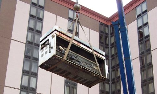 Removing Old Boiler from Multi-Story Hotel Roof